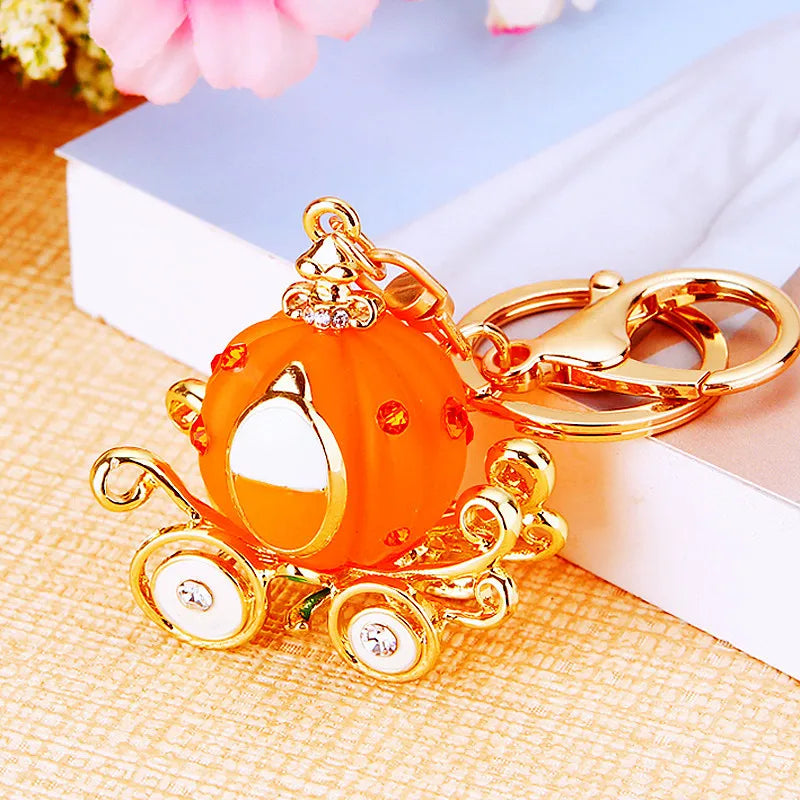 Diamond-encrusted pumpkin car, car keychain, creative bag, pendant, metal key chain ring, accessories, gifts.