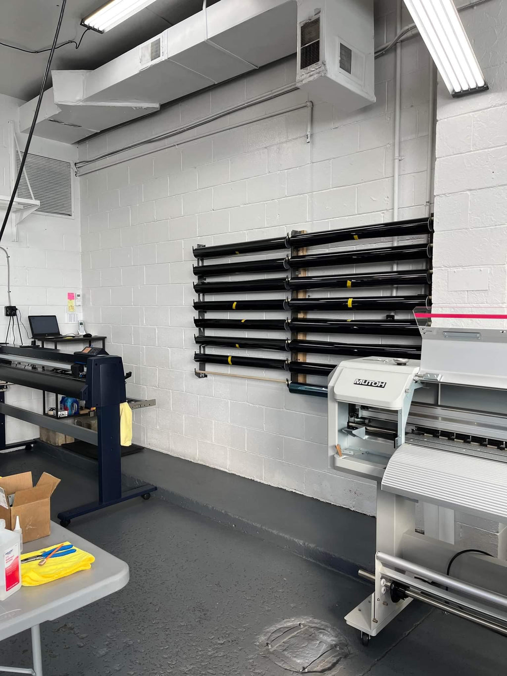 Wall-Mounted Vinyl, Tint, Paper & Cloth Wrap Rack - Modular Storage | Martin Metalwork"